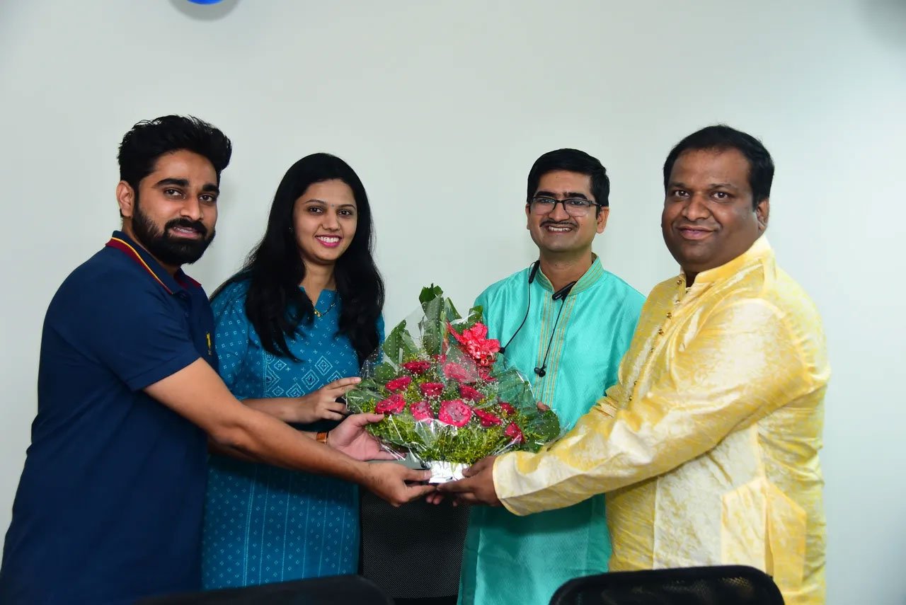 Bharat Gidde (far right) with some of his team